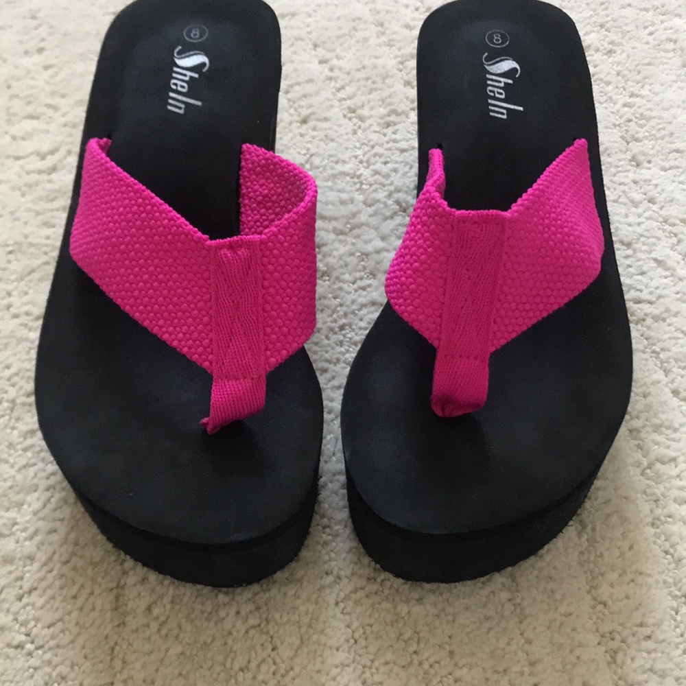 Hot pink flip flops